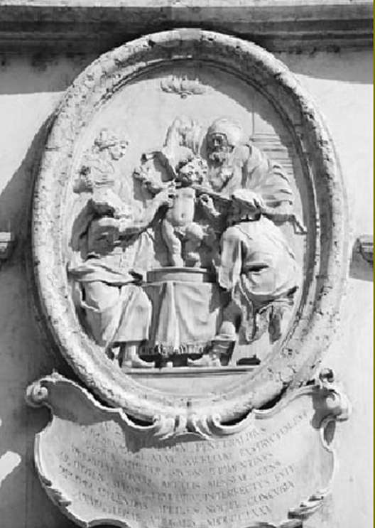 A depiction of the bestial act - a stone carving shown 0n a church in Italy