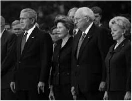 Bush with his Satanic buddies in Sept. 2007 showing the satanic hand sign of "Horned Hand or The Mano Cornuto" with his left hand