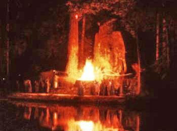 Ceremony at Bohemian Grove. A photograph taken on a long lense at Bohemian Grove