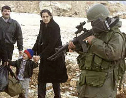 Soldier pointing a gun at the innocent civilian family in Lebanon in 2006